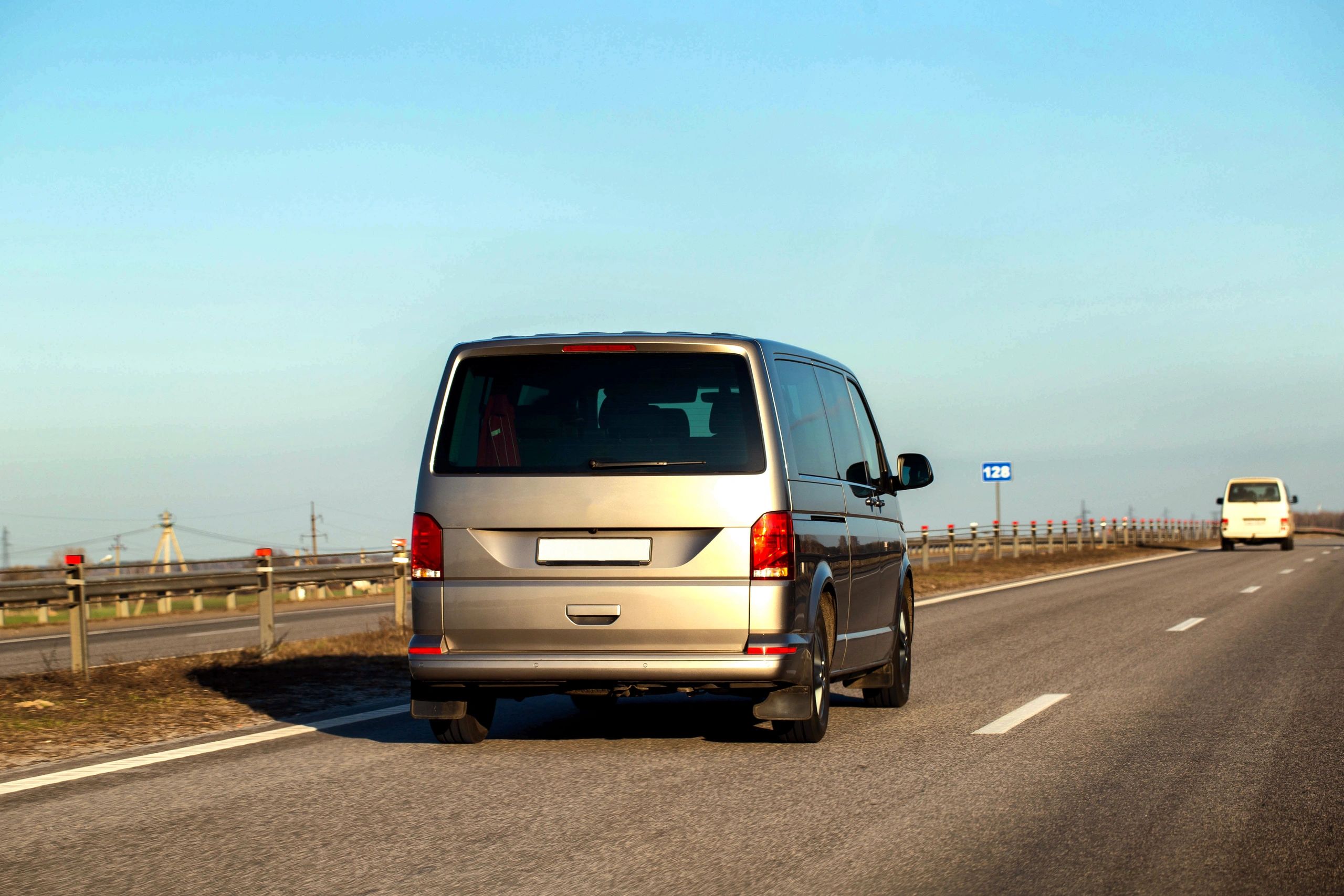 Van driving on open road